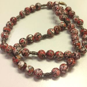 Handmade coral tone necklace